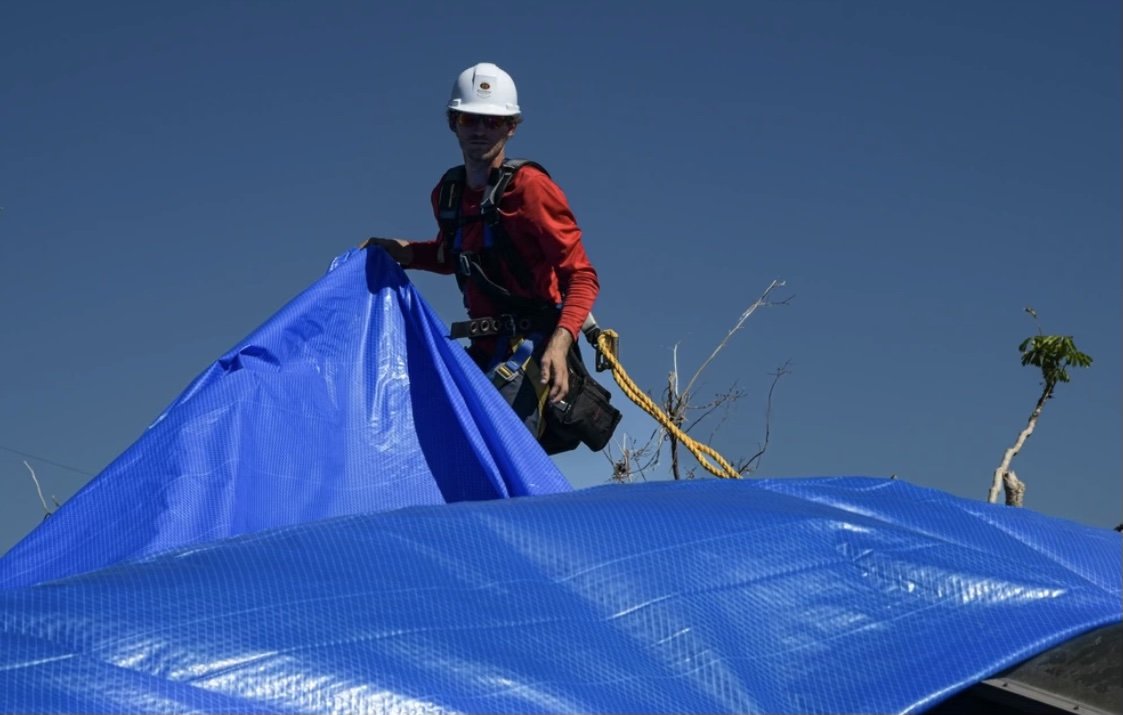 Brandon Trussell, coastal services in Tallahassee, on a Blue Roof job.