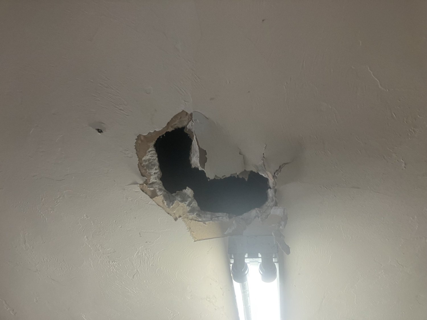 A repaired section before paint.