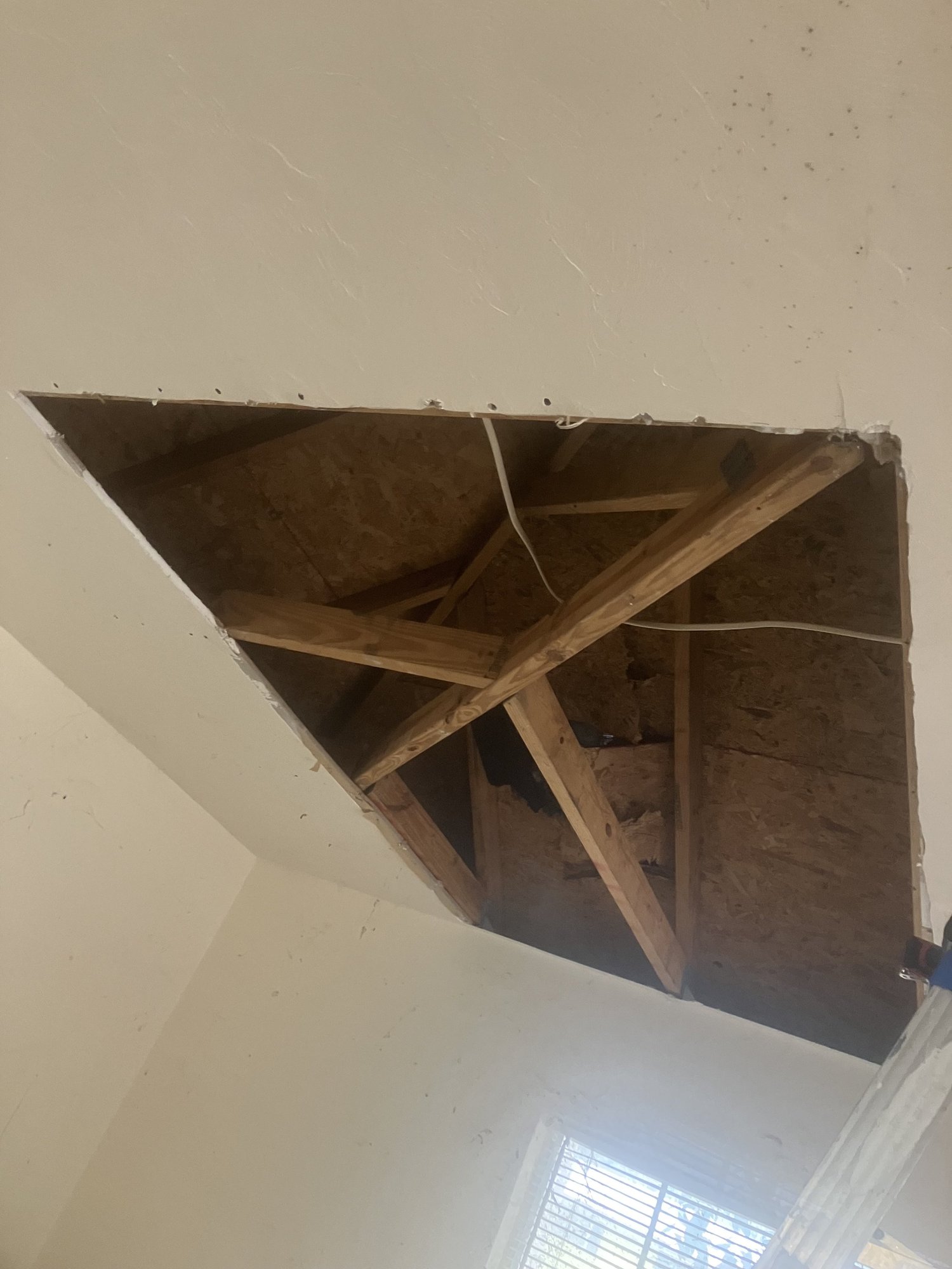Ceiling or wall repair in progress.