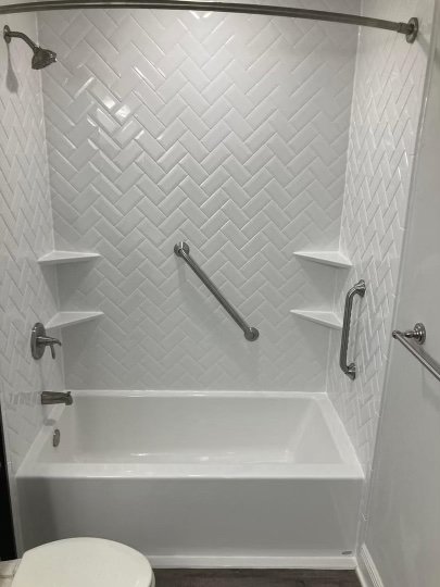 A prefabricated bathroom unit during install.